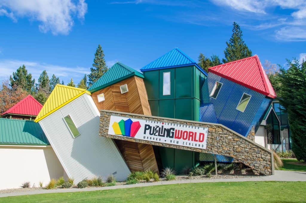 Puzzling World in Wanaka, with models of houses at different angles.